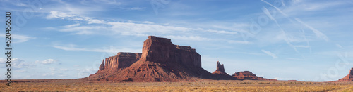 Desert Rocky Mountain American Landscape. Sunny Blue Sky Day. Oljato-Monument Valley, Utah, United States. Nature Background Panorama