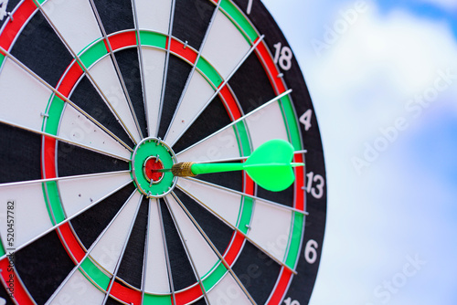 circle target for shooting on dart board aiming, to succes comes after a lot of tries