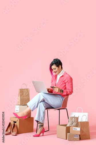 Beautiful woman with credit...