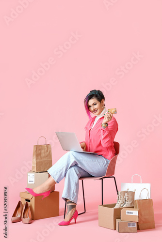Beautiful woman with credit...