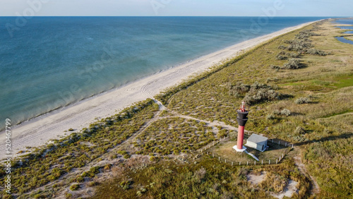 lighthouse on the seashore long sandy coastline, Ukraine, Odessa region