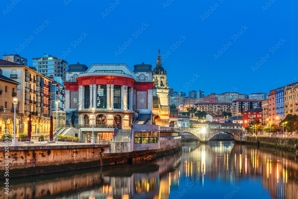 Bilbao, Market Building at Twilight in Ribera riverbank - Bilbau Old Town Landscape - Seven Streets District - Basque Country, Spain