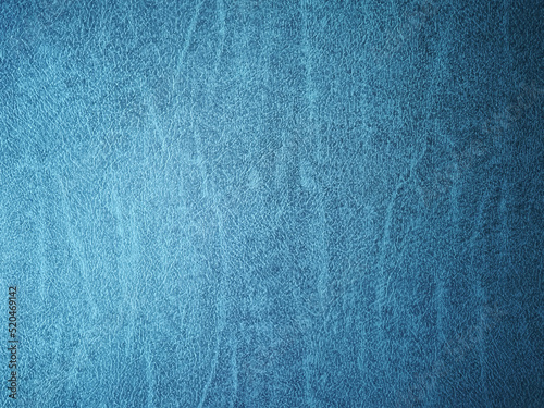 Blue leather surface textured background. photo