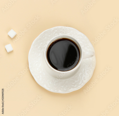 Coffee cup with saccharin pills.