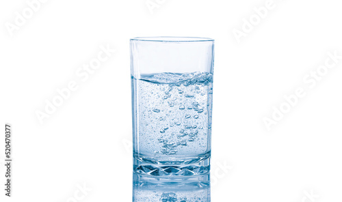 A glass of sparkling water isolated on white background.