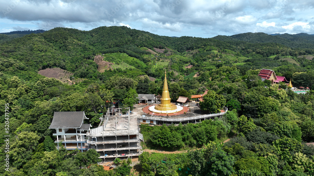 Golden pagoda in The temple on top of mountain.