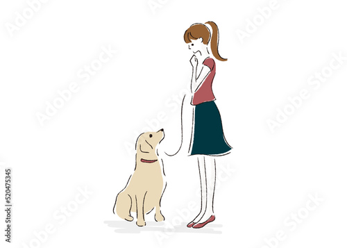 犬と散歩中の女性