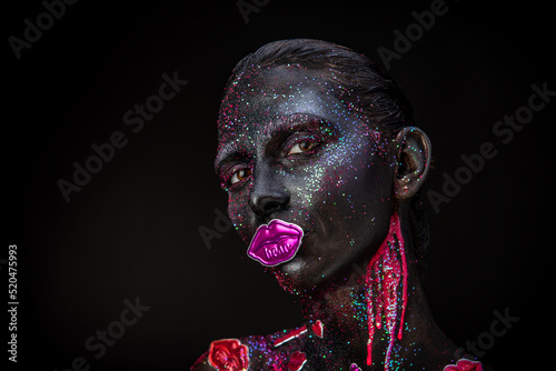 Mystical makeup of a woman in the dark