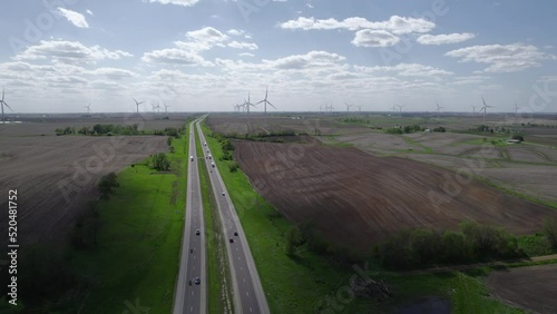 Aerial view of the wind turbine in Iowa fields. Wind turbine farms. Eco energy in developed