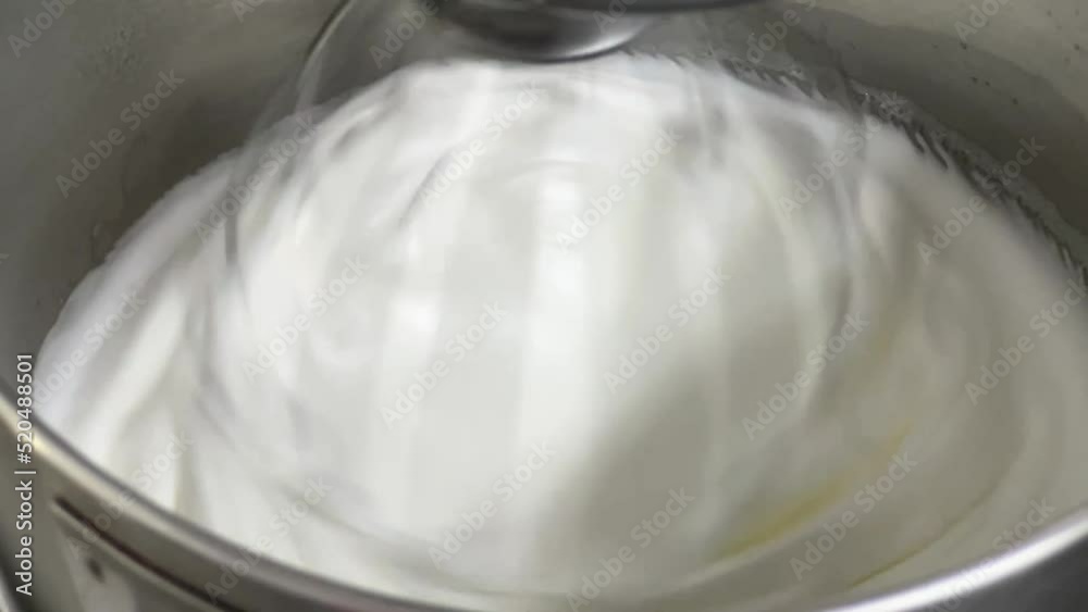 Glossy, soft and fluffy Swiss meringue buttercream making in progress