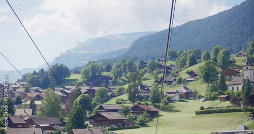 Long shot, ski lift, Switzerland, valley, aerial, rising, mountains, low to mid height photo