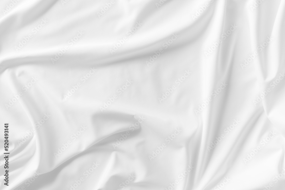 White fabric. luxurious white fabric texture background. Creases of satin, silk, and cotton.