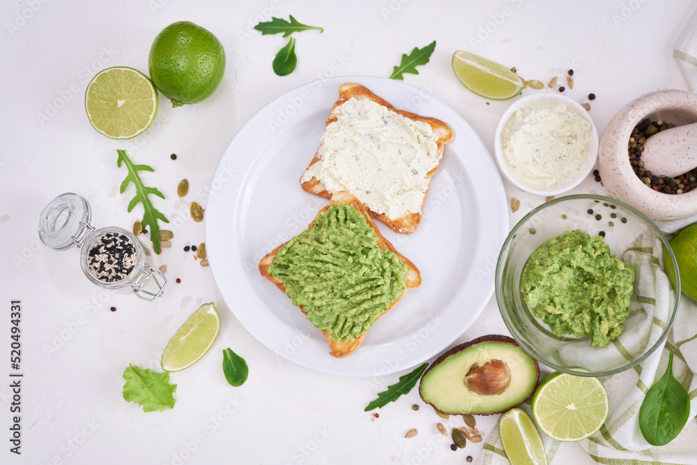 avocado and cream cheese toasts on a plate and ingredients