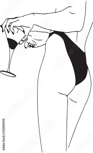 silhouette of a woman in a black bikini and holding a glass of wine