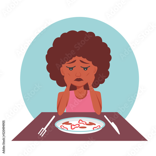 Very thin Afro American Black woman with mental disorder anarexia and bulimia looks at a plate of diet food and is afraid to eat, dissatisfied with her weight, wants to lose more weight