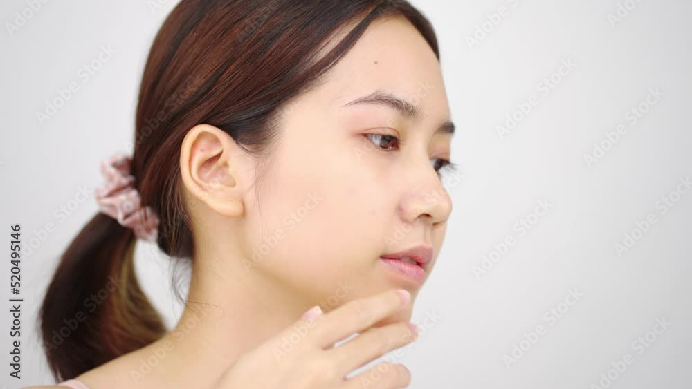 Slow motion of Asian girl beautiful woman face close up looking camera portrait healthy skin natural make up clean beauty fresh skin young female beautiful model. Slow motion of Asian girl beautiful woman face close up looking camera portrait healthy skin natural make up clean beauty fresh skin young female beautiful model.