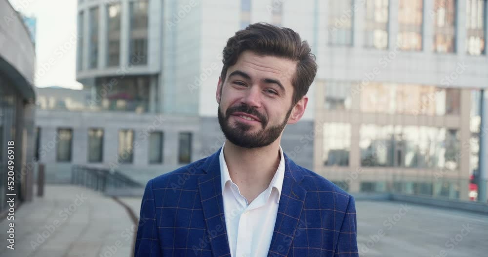 Confident young man talking looking at camera. Confident young man talking looking at camera.