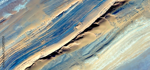 abstract landscape photo of the deserts of Africa from the air emulating the shapes and colors of the skin of the Sahara, Genre: Abstract naturalism, from the abstract to the figurative