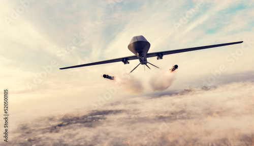 Fotografering Military combat drone UAV launching missiles