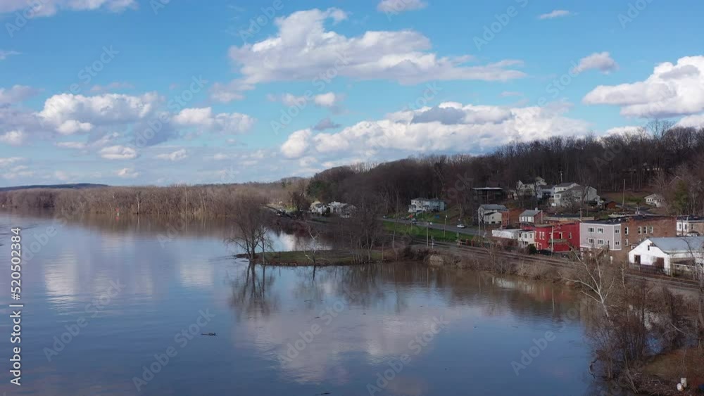 Castleton on hudson seen from a drone over the hudson river with a passing train Castleton on hudson seen from a drone over the hudson river with a passing train