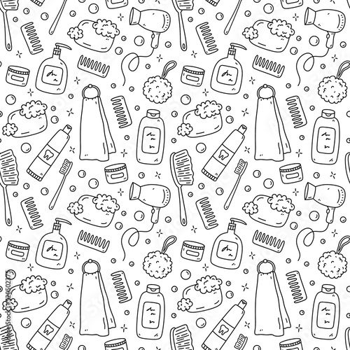 Seamless pattern with bath accessories - hair dryer, scrubbing brush, loofah, soap, cream, towel, toothbrush.Vector hand-drawn illustration in doodle style.Perfect for print, wrapping paper, wallpaper