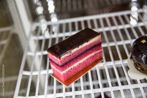 Delicious gluten free cake in the fridge in a cafe