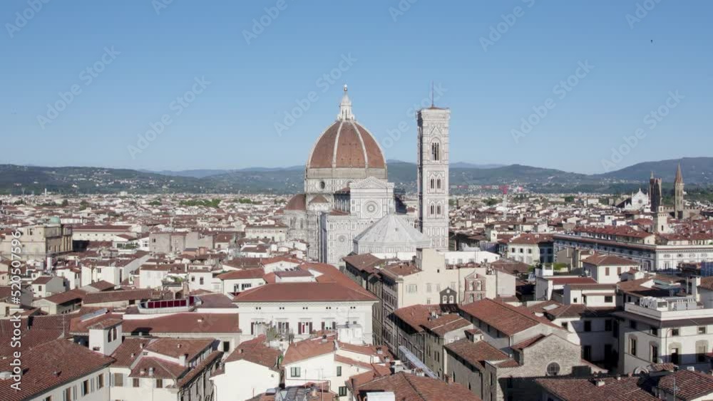 Iconic Florence Cathedral stands proud above city; aerial view Iconic Florence Cathedral stands proud above city; aerial view