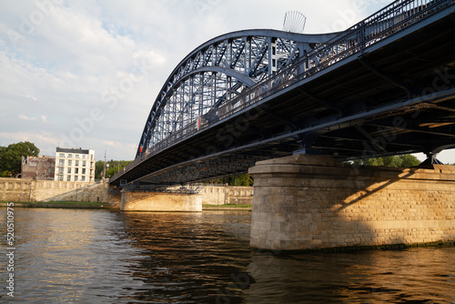 Jozef Pilsudski bridge Kraków (Most Marszałka Józefa Piłsudskiego, Second Bridge, Józef Piłsudski) on Vistula River (Wisła) in Krakow, Poland. photo