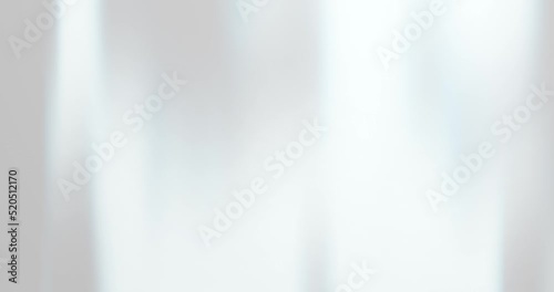 White clean abstract background with light leak and bright motion. White loop simple abstract background. Pearl and crystal effect on white backdrop in looping footage animation