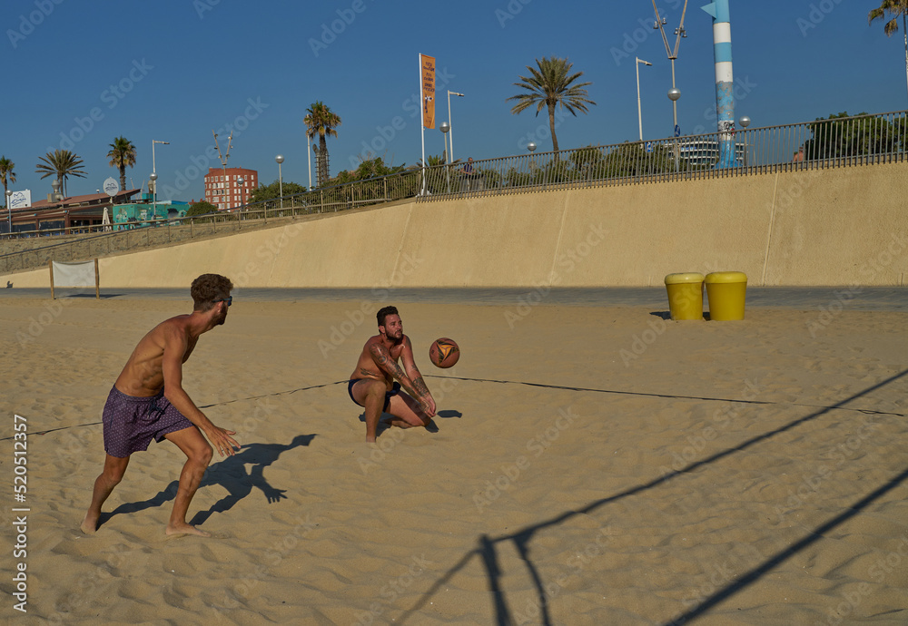 Obraz premium Volleyball match on the beach