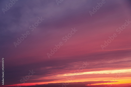 Evening sky with pink clouds at sunset, cloudy landscape