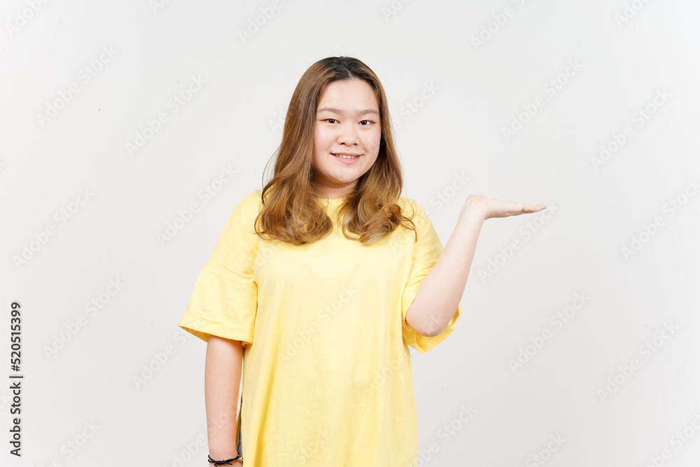 Showing and Presenting Product on Open Palm of Beautiful Asian Woman wearing yellow T-Shirt Showing and Presenting Product on Open Palm of Beautiful Asian Woman wearing yellow T-Shirt