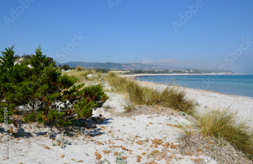 White sandy beach and emerald sea in Sardinia