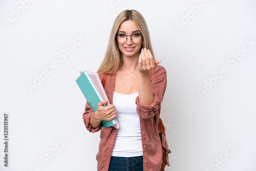 Pretty student blonde woman isolated on white background inviting to come with hand. Happy that you came