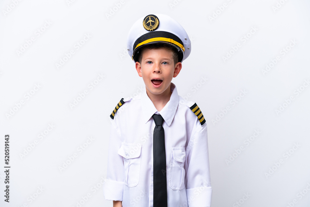 Little airplane pilot boy isolated on white background with surprise facial expression Little airplane pilot boy isolated on white background with surprise facial expression