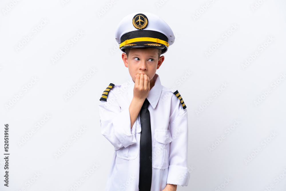 Little airplane pilot boy isolated on white background having doubts Little airplane pilot boy isolated on white background having doubts