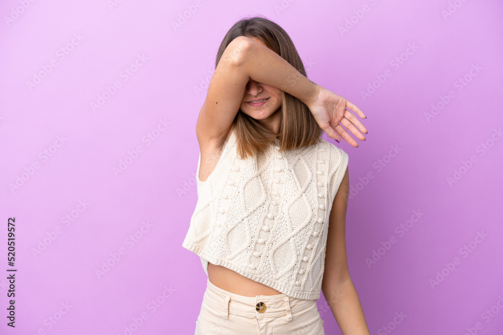 Young caucasian woman isolated on purple background covering eyes by hands Young caucasian woman isolated on purple background covering eyes by hands