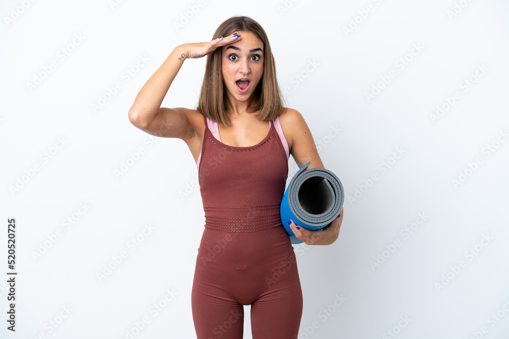Young sport caucasian woman going to yoga classes isolated on white background with surprise expression Young sport caucasian woman going to yoga classes isolated on white background with surprise expression