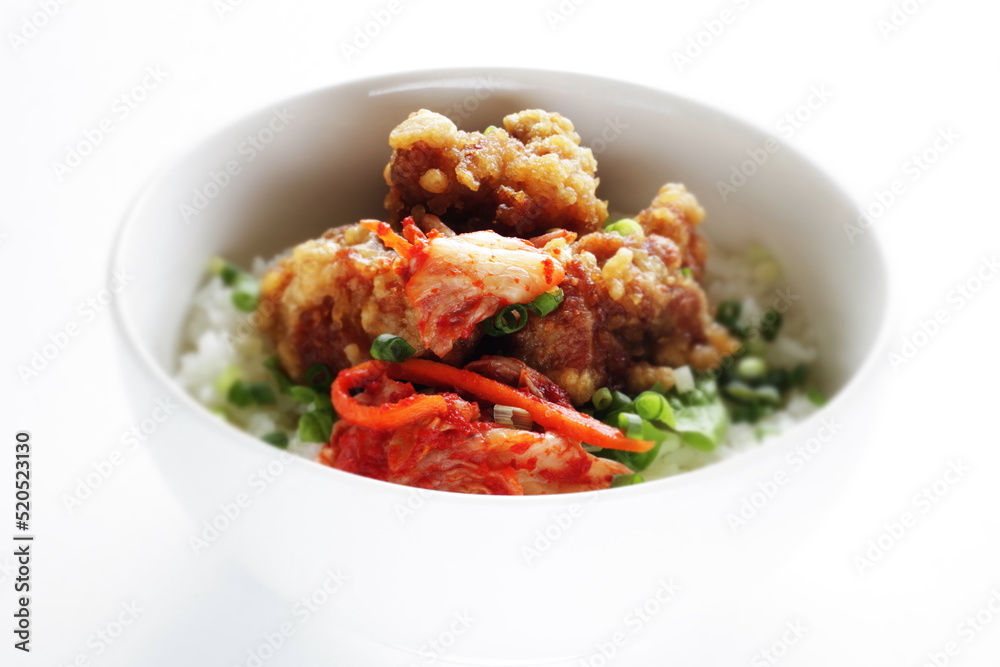 Korean style cafe food, fried chicken and Kimchi on rice with spring onion Korean style cafe food, fried chicken and Kimchi on rice with spring onion