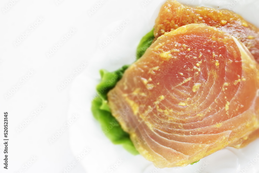Japanese cooking, miso and swordfish fillet marinated on plate for food ingredient