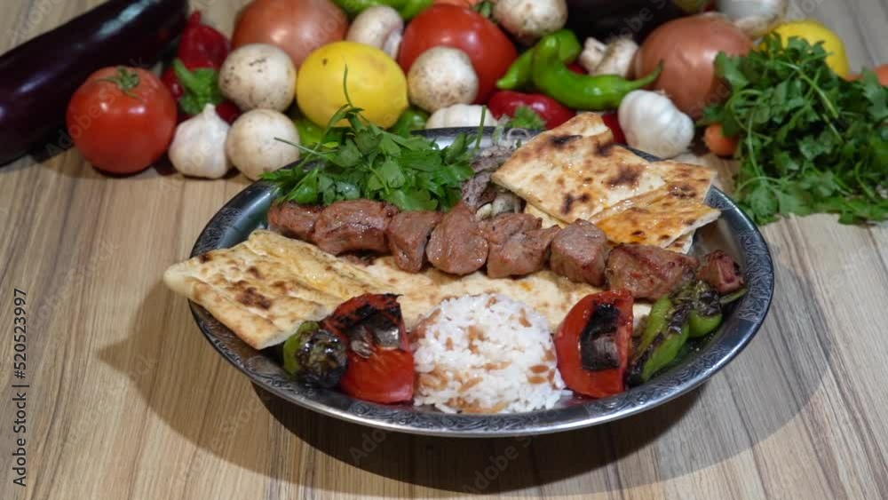 Lamb skewers on a serving plate.
Lamb shish, traditional Turkish dish. On the serving plate.
Lamb skewers on a serving plate.
Lamb shish, traditional Turkish dish. On the serving plate.