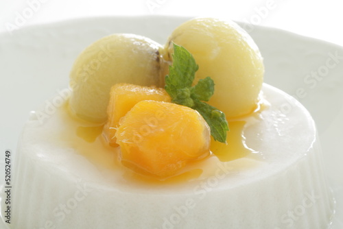 Kiwi fruit and mango on white Milk Kanten Jelly for Asian sweet dessert image