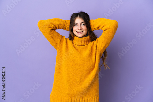 Young caucasian woman isolated on purple background laughing © luismolinero