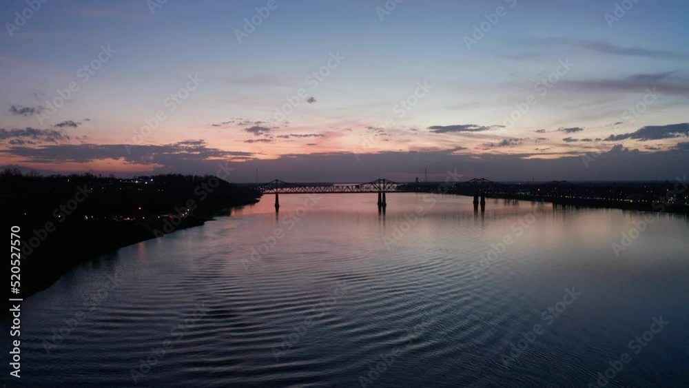 Low wide aerial shot of the Mississippi River at twilight. 4K Low wide aerial shot of the Mississippi River at twilight. 4K