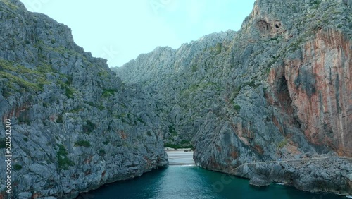 Beautiful 4k aerial view of Sa Calobra beach in Mallorca, Soller, Serra de Tramuntana mountain landscape in Balearic Islands, Spain.