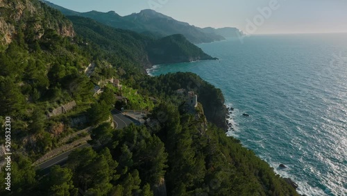 Aerial view of Torre de Verger in Banyalbufar, tourist city of Mallorca, Drone, Es Port des Canonge, Serra de Tramuntana and Mediterranean Sea, Spain
