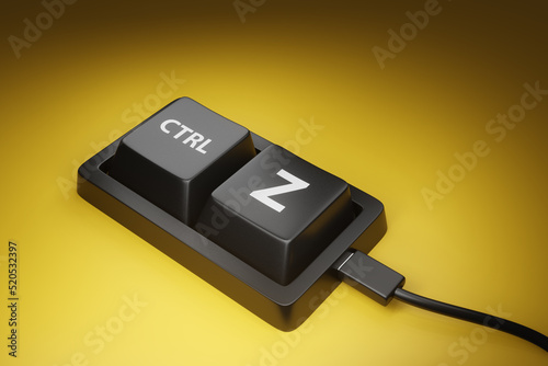 Customized keyboard showing only CTRL and Z keys on yellow background. Illustration of the concept of undo and reversal photo