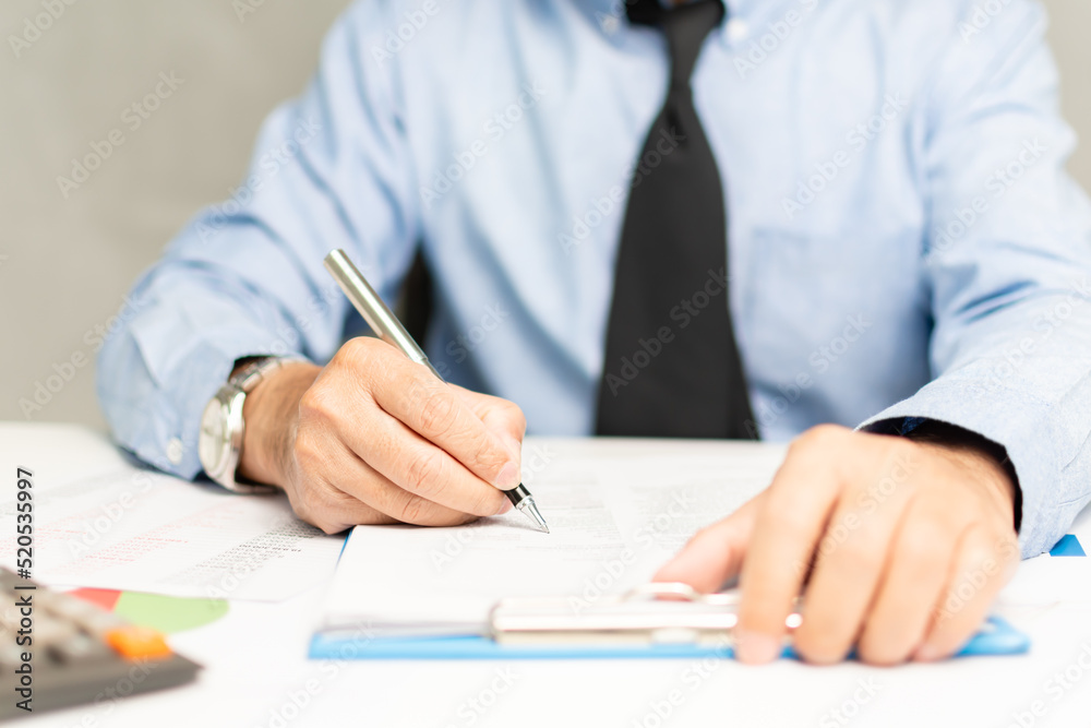 professional businessman hand holding pen writing and sign paperwork or document finance indoor at office, man manager person handwriting paper on clipboard and signature agreement approval business professional businessman hand holding pen writing and sign paperwork or document finance indoor at office, man manager person handwriting paper on clipboard and signature agreement approval business