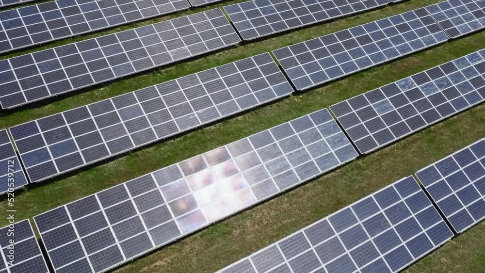 Reflection on solar panels. Alternative green energy Reflection on solar panels. Alternative green energy