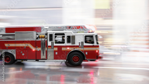 Konstfotografi Red fire truck in motion